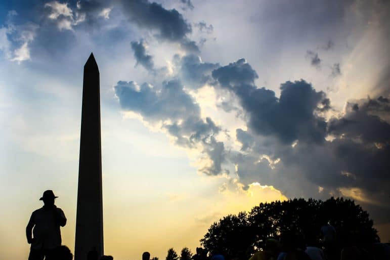 Washington Monument with clouds