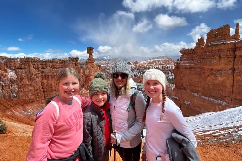 Debbie Cameron and kids in front of a canyon